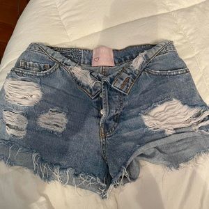Low rise device denim shorts